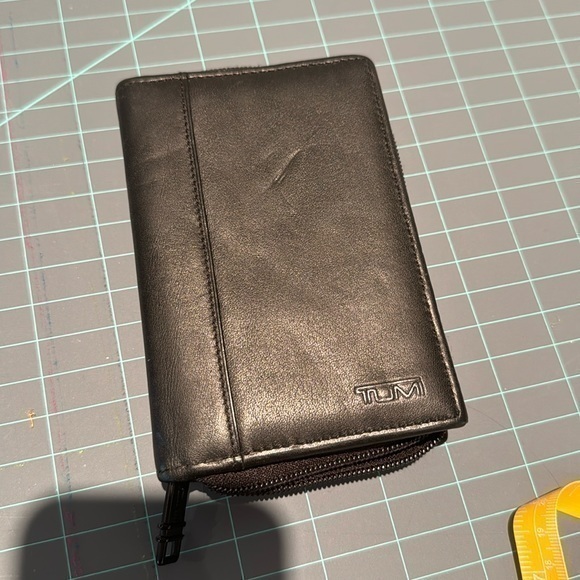 Black Tumi zip case. Was for a palm pilot, could fit cell phone etc. - Picture 1 of 7